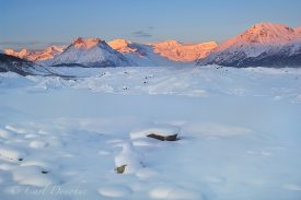 Stairway Icefall, Donoho Peak and the Wrangell Mountains, viewed over the Kennicott Glacier, winter, sunset, alpenglow, Wrangell-St. Elias National Park, Alaska.