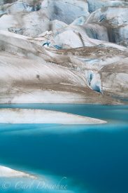 A small blue tarn on the Tana Glacier, Wrangell-St. Elias National Park, Alaska.