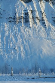 Kennicott River embankment, covered in fresh snow, winter, Wrangell-St. Elias National Park and Preserve, Alaska.